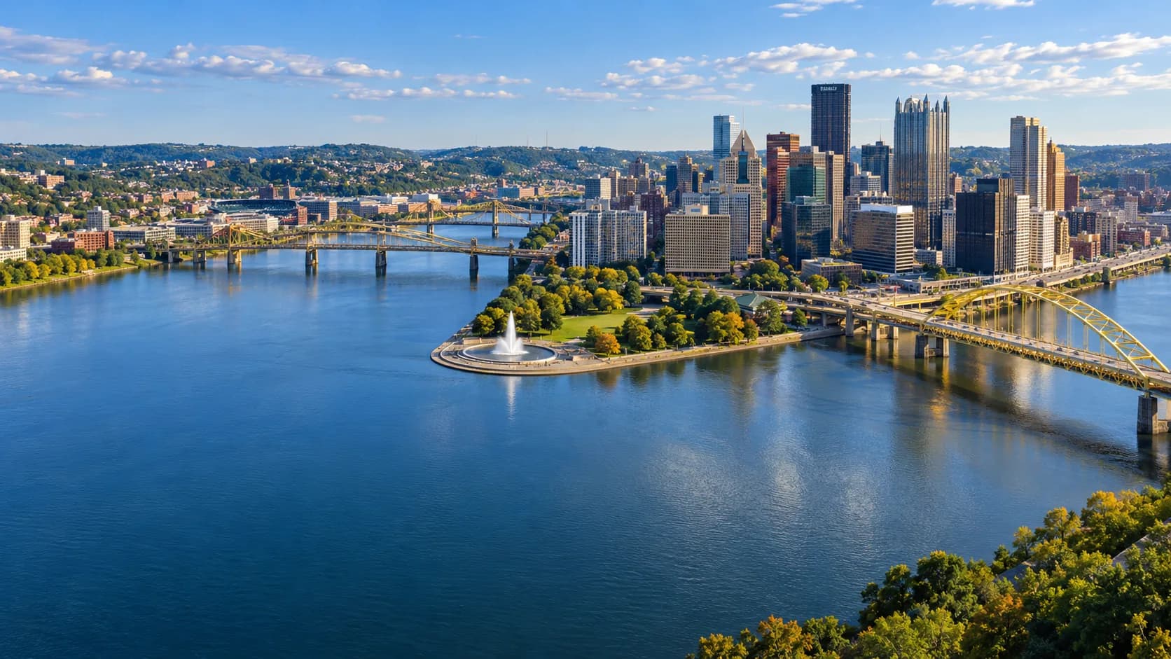 AI-generated aerial interpretation of Pittsburgh’s three rivers, Point State Park, downtown skyline, and green hills.
